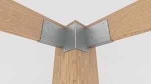 Des supports de jambes en bois personnalisés en acier et en acier inoxydable avec une ligne de presse automatisée